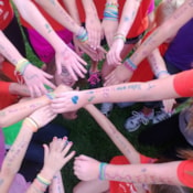 Girls arms with writing on them